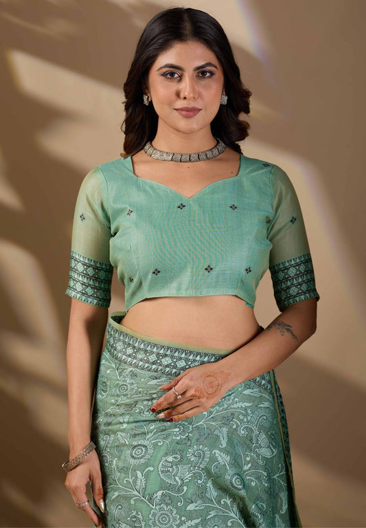 Woman in close pose wearing mint green Banarasi cotton jacquard jaal saree — Chandrikas