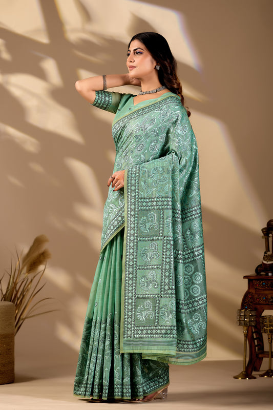 Woman in standing pose wearing sea green Banarasi-Paithani zari pallu cotton saree — Chandrikas