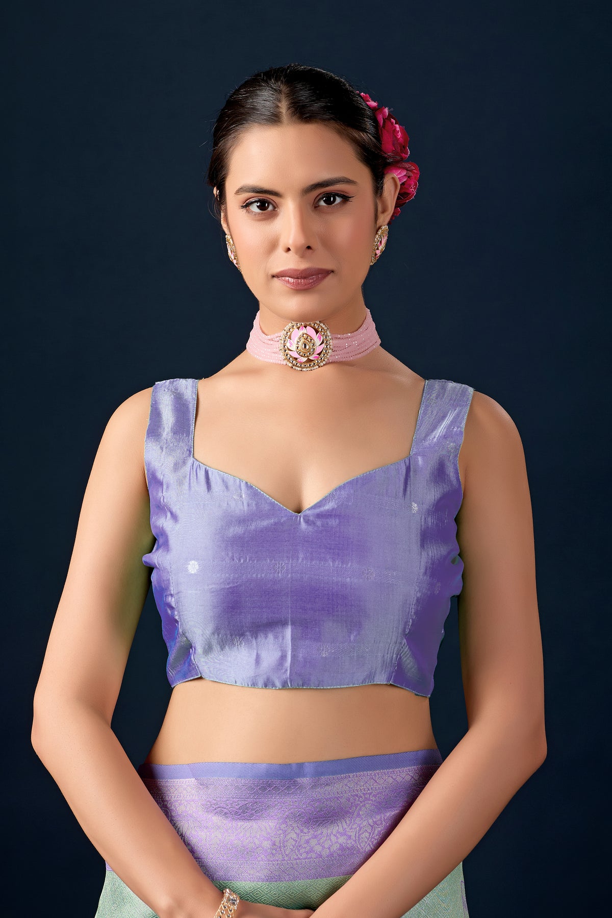 Woman in close pose wearing mint green lavender leaf motif zari pallu silk saree — Chandrikas