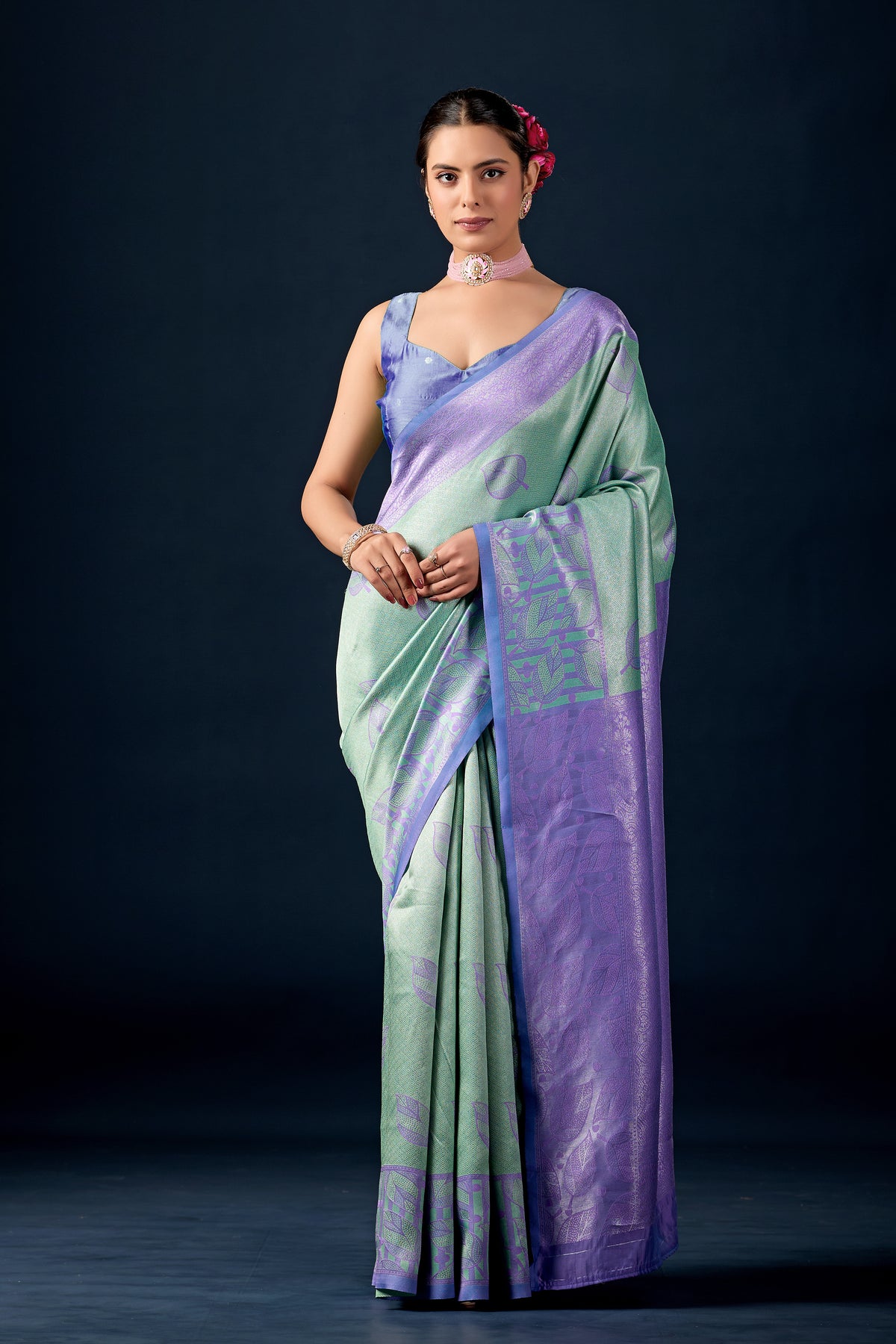 Woman in front pose wearing mint green lavender leaf motif zari pallu silk saree — Chandrikas