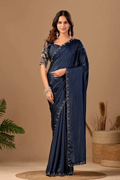 Woman wearing a navy blue Tesla saree with floral embroidered blouse and border — Chandrikas