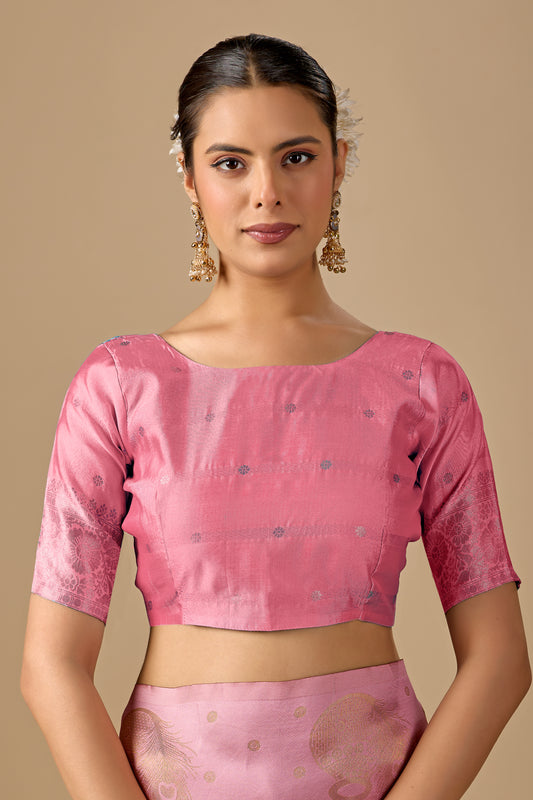 Woman in close pose wearing olive gold pink silk matka motif border saree — Chandrikas