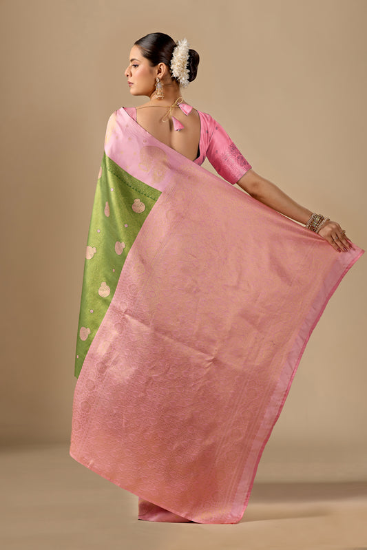 Woman draping olive gold pink silk matka motif border saree showing pallu design — Chandrikas