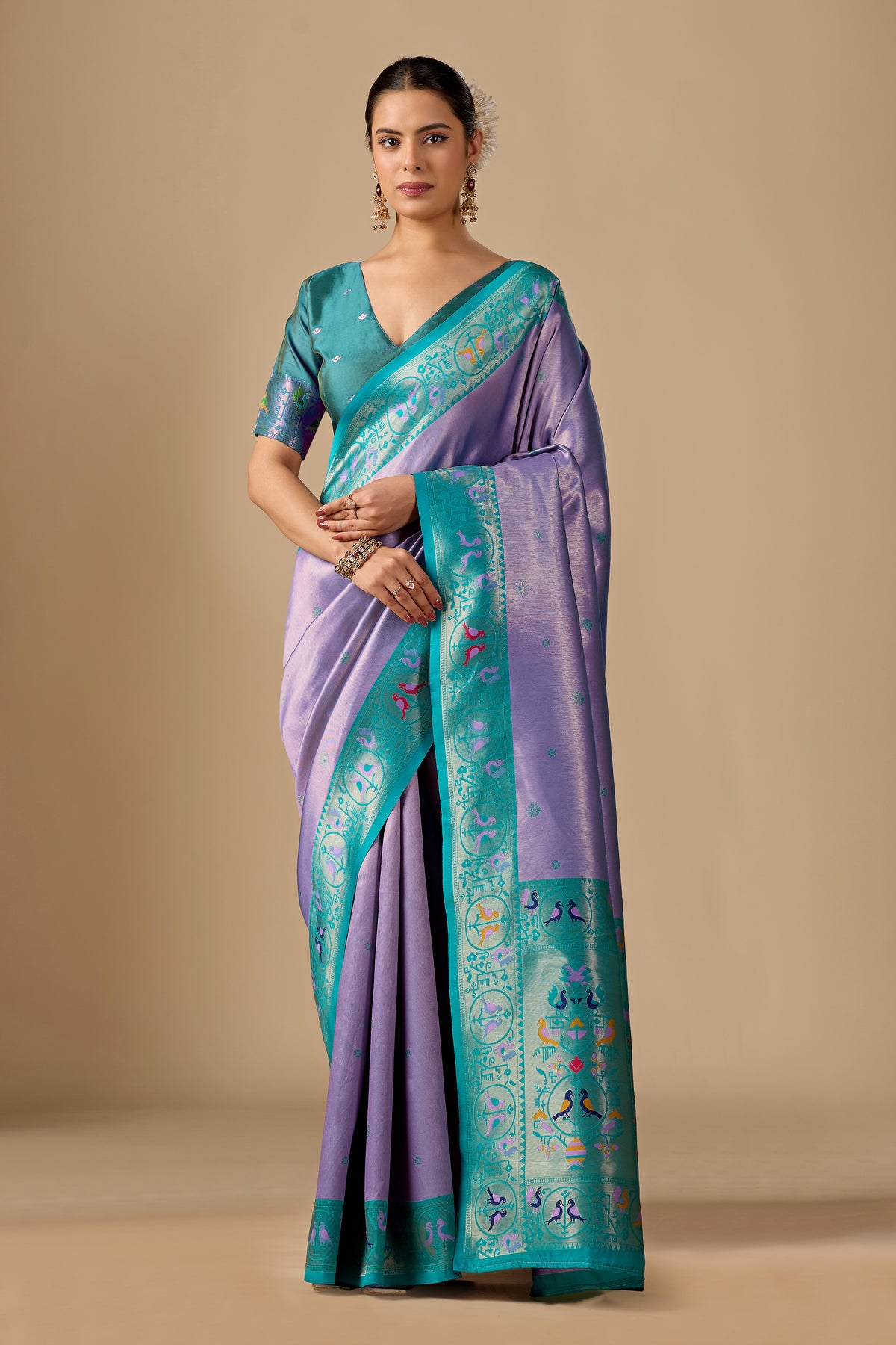 Woman in front pose wearing pastel lavender Paithani silk bird border pallu saree — Chandrikas