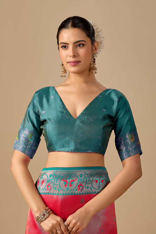 Woman in close pose wearing peach Paithani silk bird border pallu saree — Chandrikas