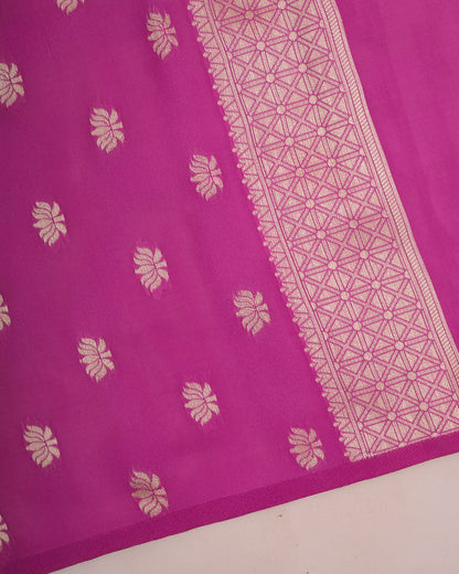 Fabric closeup of Pink Banarasi soft silk saree body with gold zari micro buti and glossy finish — Chandrikas