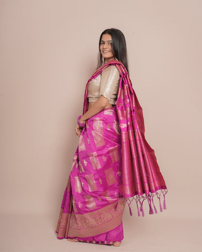 Side pose of Pink Banarasi soft silk paisley border zari pallu saree showing pallu fall and zari weave — Chandrikas