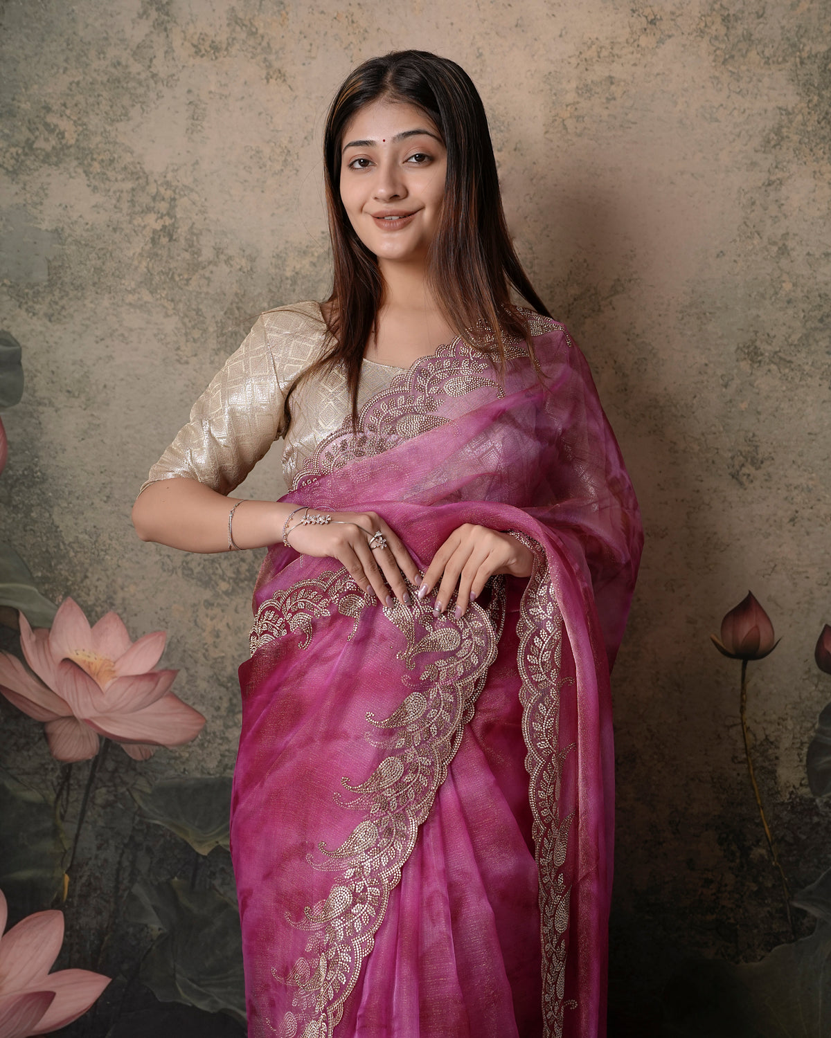 Woman in close pose wearing pink magenta double shade tissue crush Jharkan border saree — Chandrikas