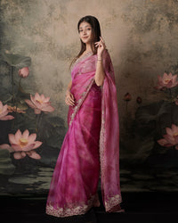 Woman in standing pose wearing pink magenta double shade tissue crush Jharkan border saree — Chandrikas