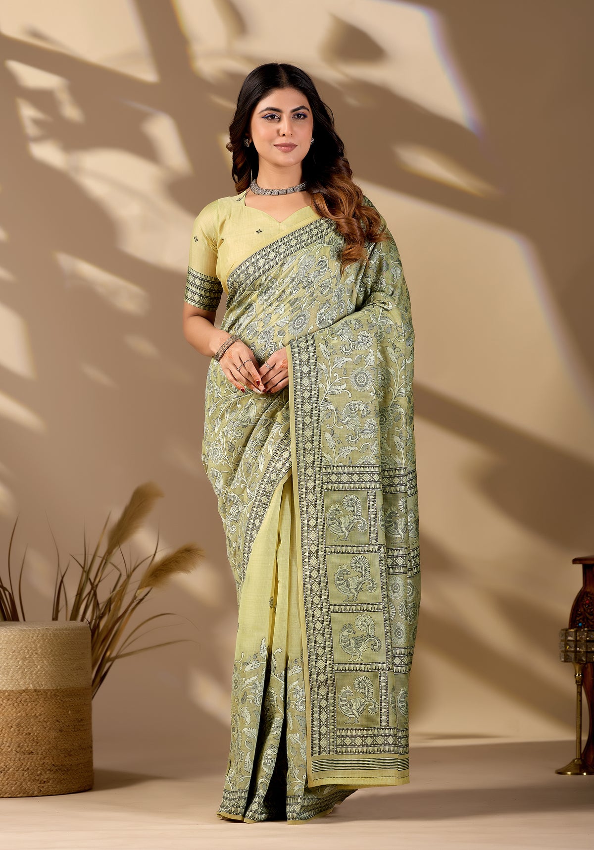 Woman in front pose wearing pista green Banarasi cotton jacquard jaal saree — Chandrikas