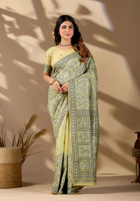 Woman in front pose wearing pista green Banarasi cotton jacquard jaal saree — Chandrikas