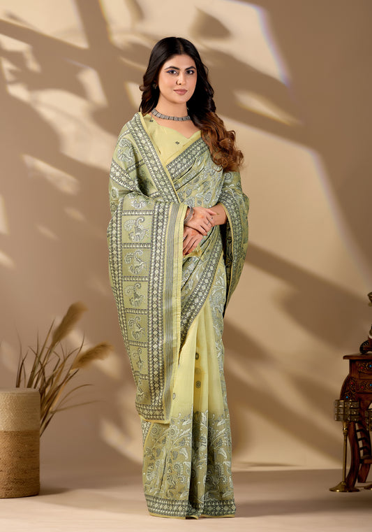 Woman in standing pose wearing pista green Banarasi cotton jacquard jaal saree — Chandrikas