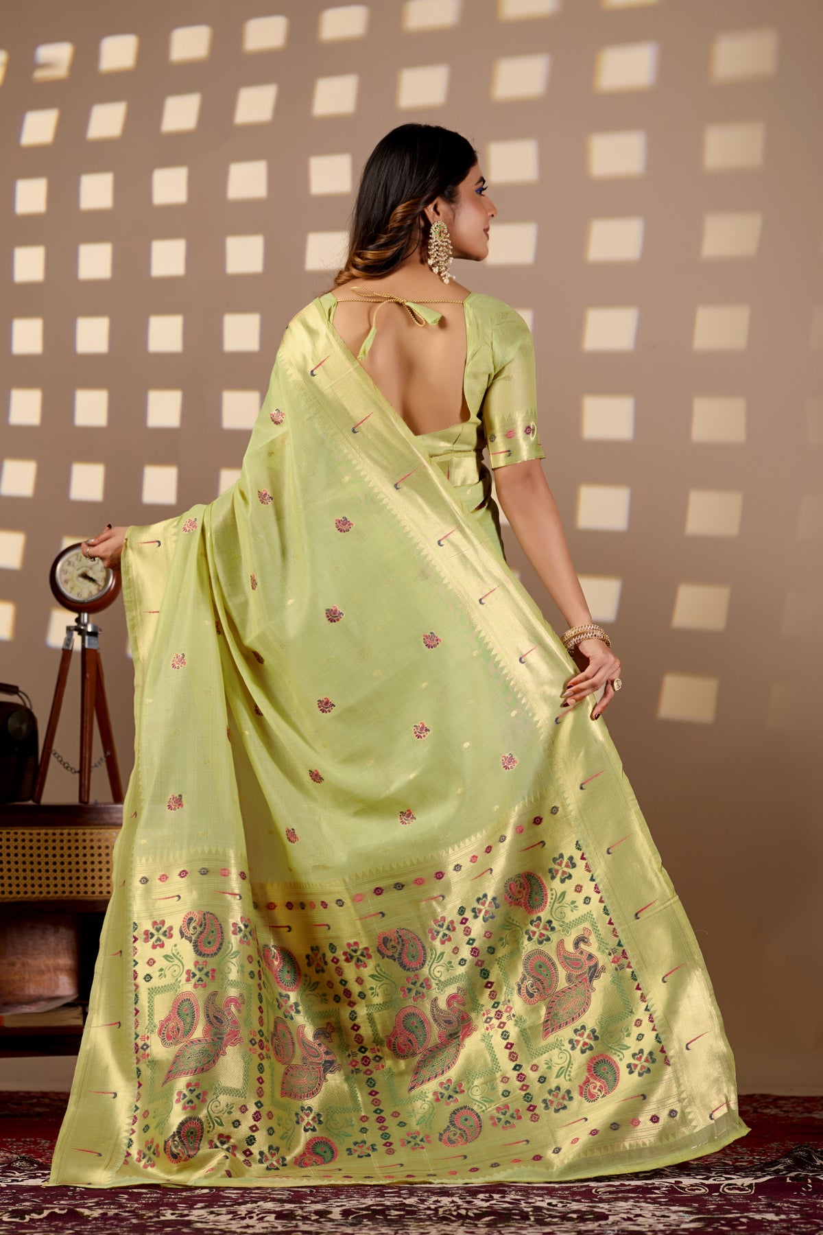 Woman in back pose wearing pista green Banarasi-Paithani Meenakari cotton saree — Chandrikas