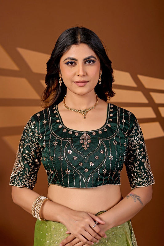 Closeup of pista green sequin embroidered blouse piece paired with chiffon silk saree — Chandrikas