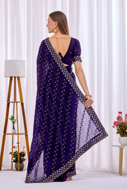 Back view of Purple satin floral thread work designer border saree with pallu and blouse — Chandrikas