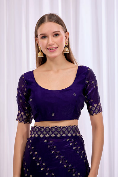 Model wearing Purple satin floral thread work designer border saree with embroidered blouse front view — Chandrikas