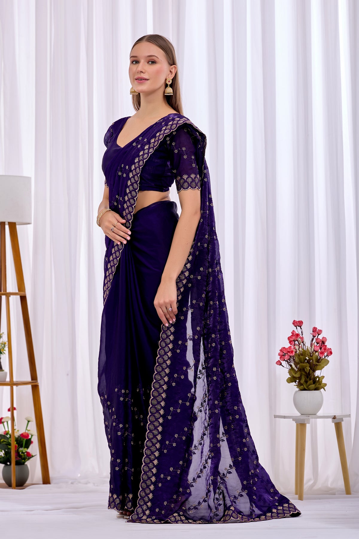 Pallu drape detail of Purple satin floral thread work designer border saree with all-over embroidery — Chandrikas