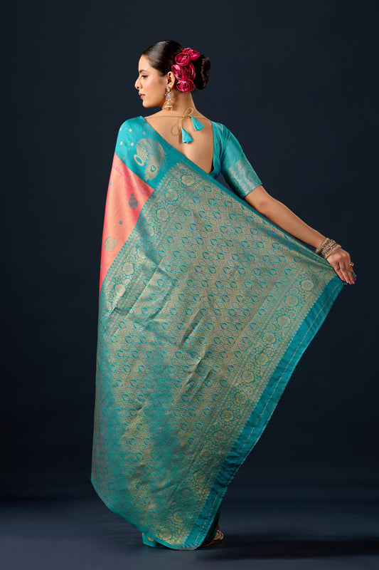 Woman draping rama green orange silk matka motif border saree showing pallu design — Chandrikas