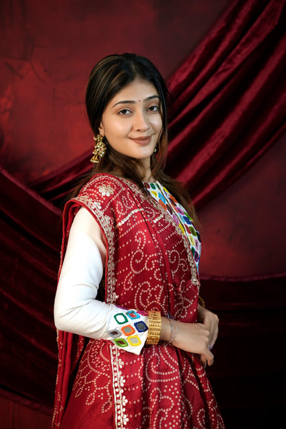 Woman in front pose wearing red Bandhani saree with Gota Patti zari border — Chandrikas