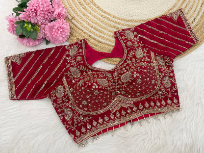 Red sequin embroidered designer blouse flatlay showing sleeve detail — Chandrikas