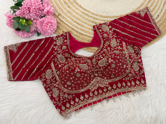 Red sequin embroidered designer blouse flatlay showing sleeve detail — Chandrikas