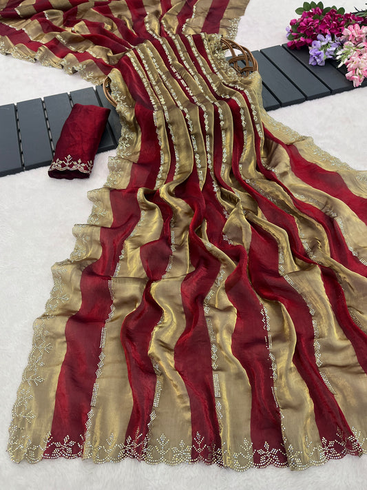 Woman in side pose wearing red striped satin patta saree with golden border — Chandrikas