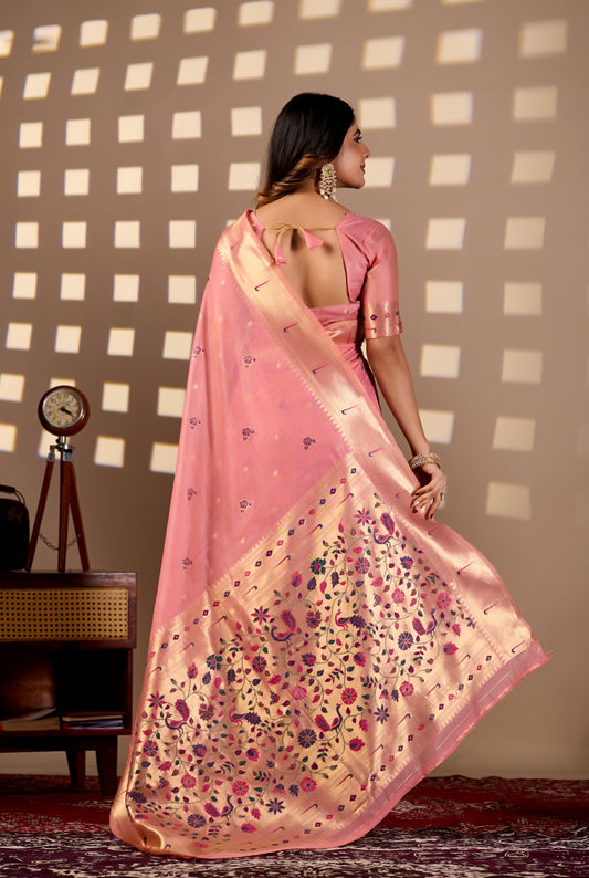 Woman draping rose pink Banarasi-Paithani Meenakari cotton zari pallu saree showing peacock motif — Chandrikas