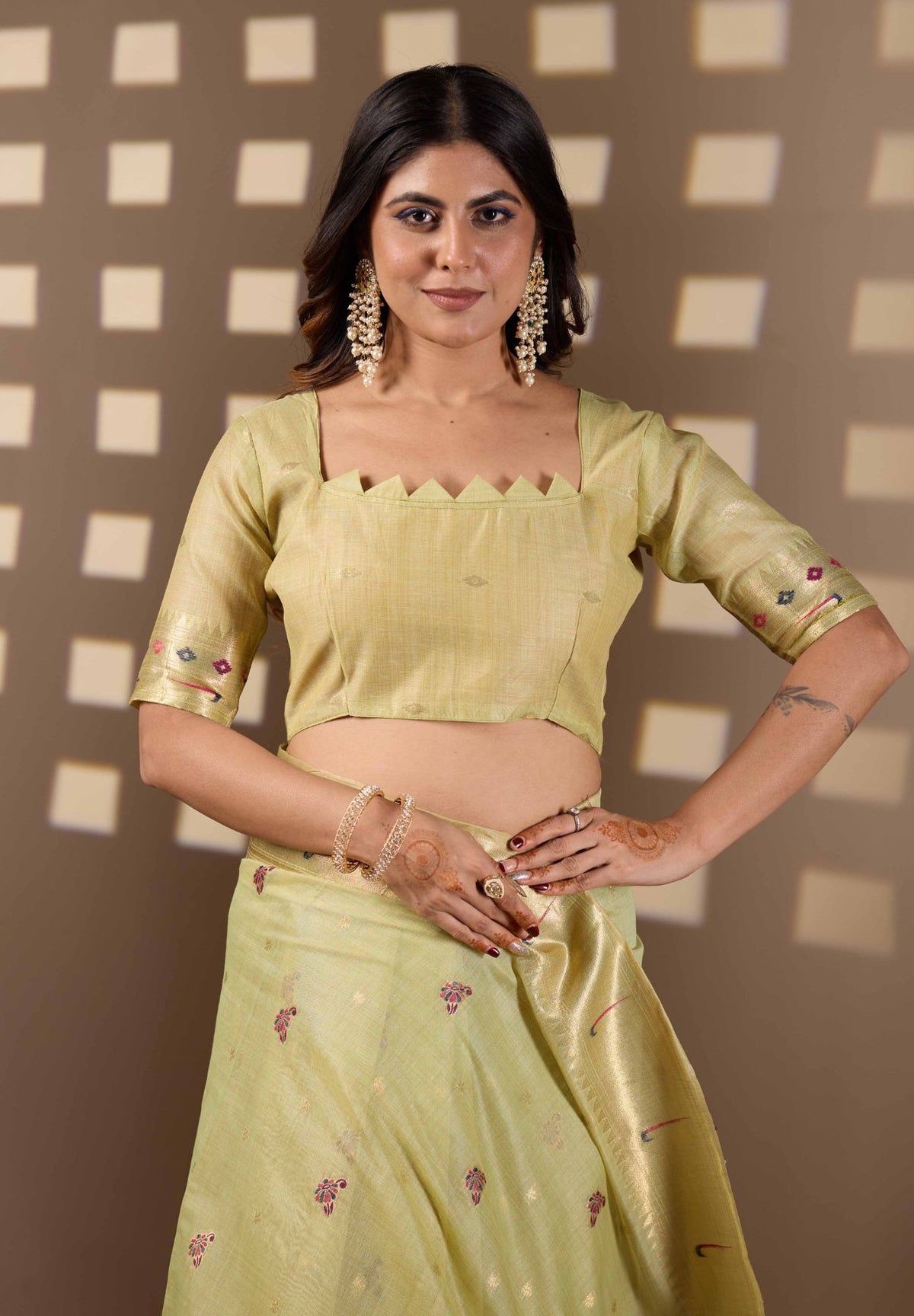 Woman in close pose wearing sea green Banarasi-Paithani Meenakari cotton zari pallu saree — Chandrikas