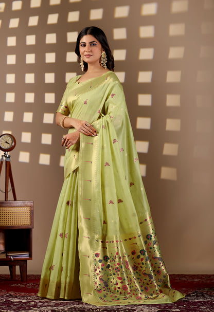 Woman in standing pose wearing sea green Banarasi-Paithani Meenakari cotton zari pallu saree — Chandrikas