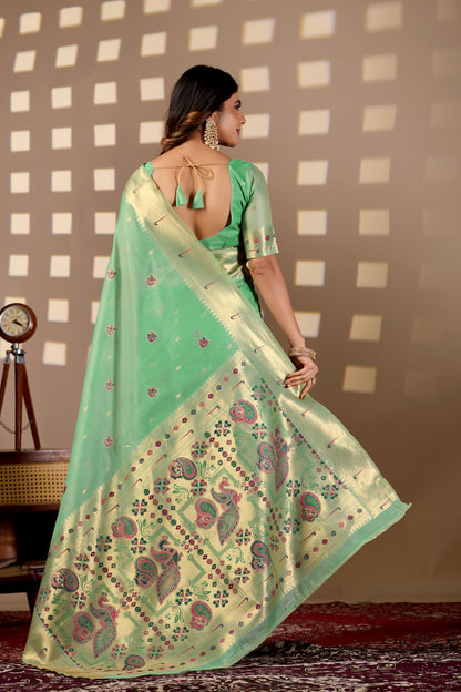 Woman in back pose wearing sea green Banarasi-Paithani Meenakari cotton saree — Chandrikas