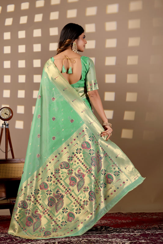 Woman in back pose wearing sea green Banarasi-Paithani Meenakari cotton saree — Chandrikas