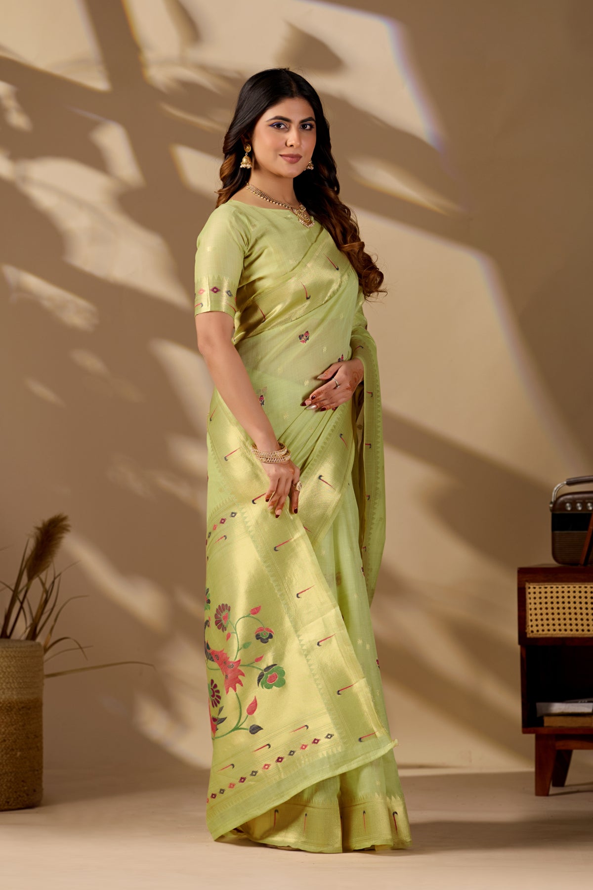 Woman in standing pose wearing sea green Banarasi-Paithani zari pallu cotton saree — Chandrikas