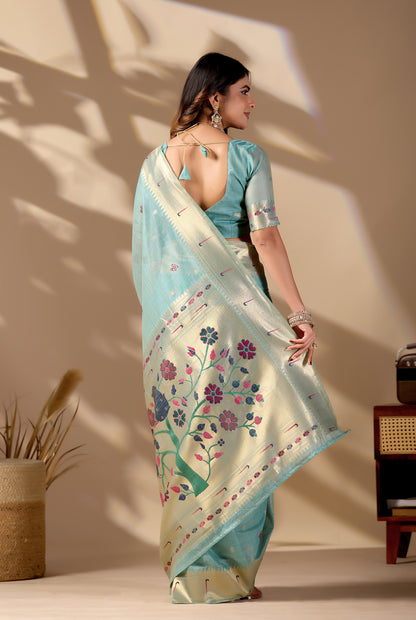 Woman in walking pose wearing sky blue Banarasi-Paithani fusion cotton saree — Chandrikas