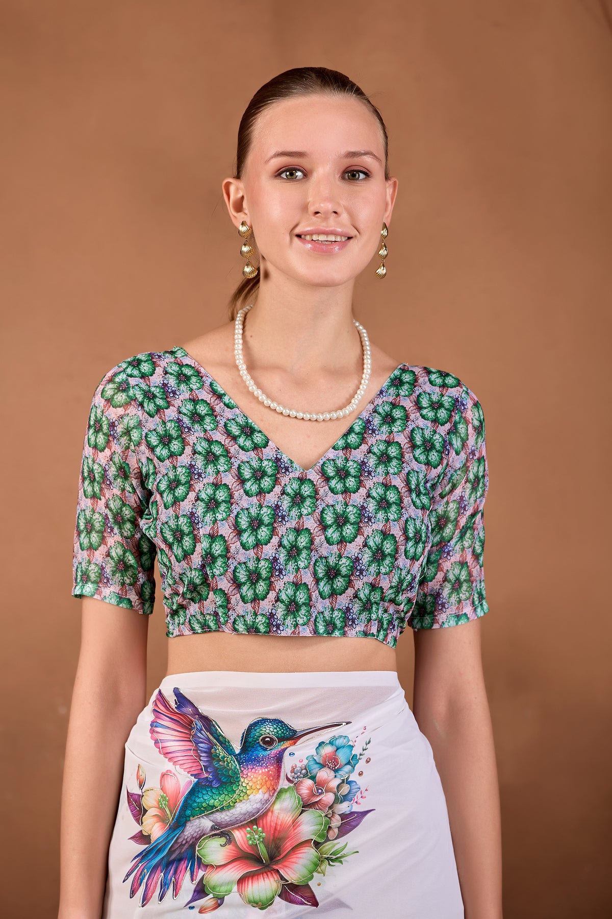 Model wearing White Bottle Green floral bird printed weightless saree with matching green printed blouse front view — Chandrikas
