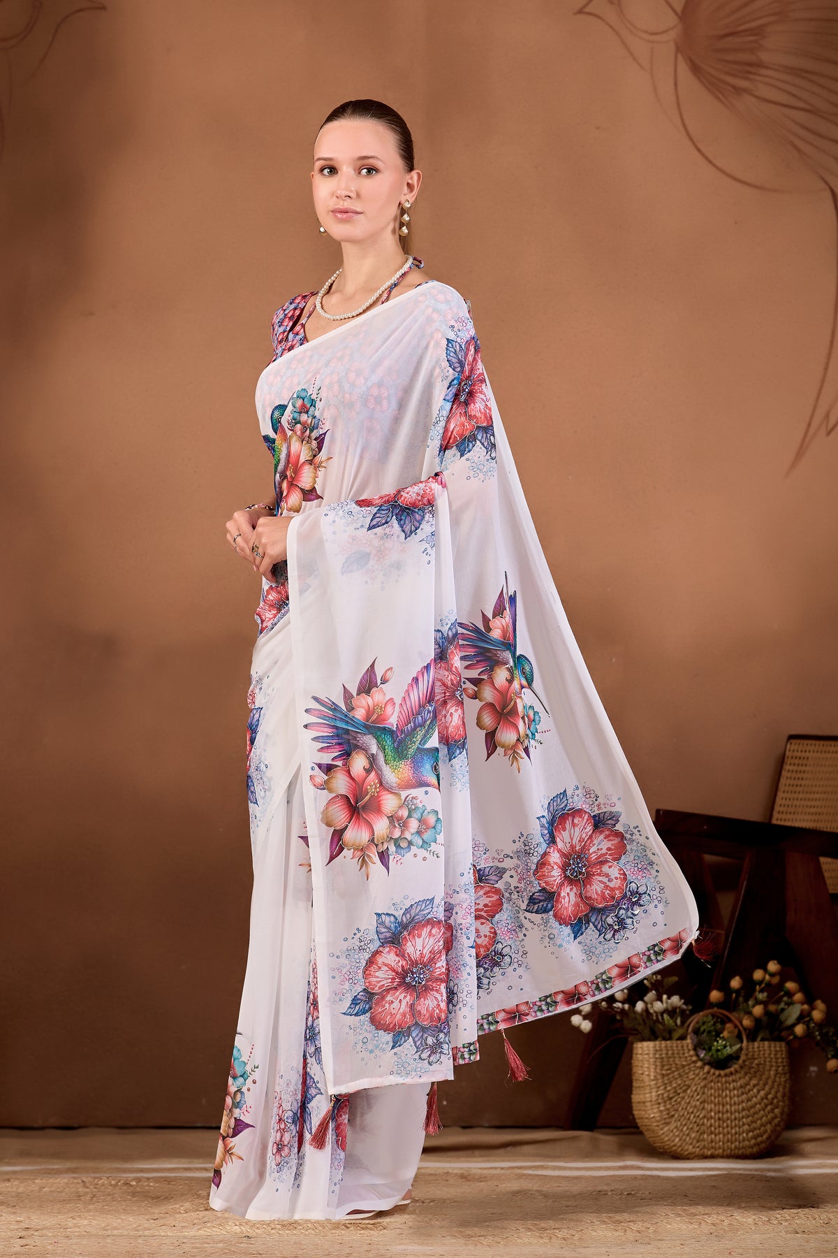 Side pose showing pleats and flowing drape of White Maroon floral bird printed weightless saree — Chandrikas