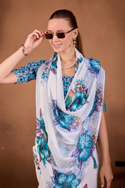 Close view of White Mor Peach floral bird printed weightless saree pallu with blue flowers and bird motif — Chandrikas