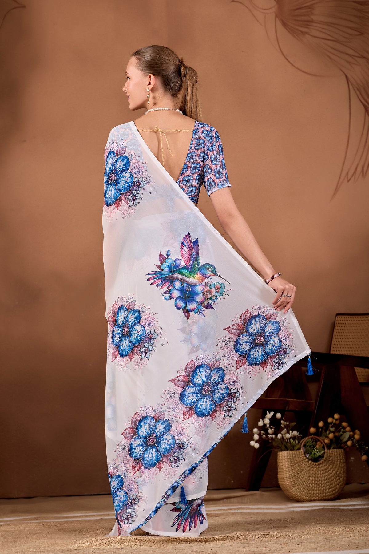 Back view of White Navy Blue floral bird printed weightless saree showing pallu and floral print — Chandrikas