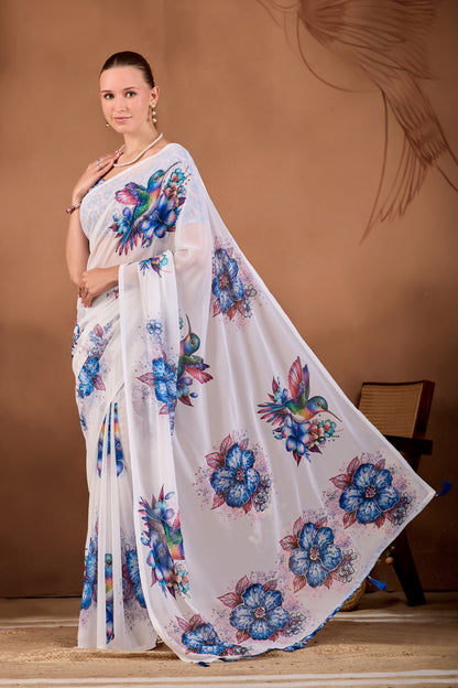 Side pose showing pleats and flowing drape of White Navy Blue floral bird printed weightless saree — Chandrikas