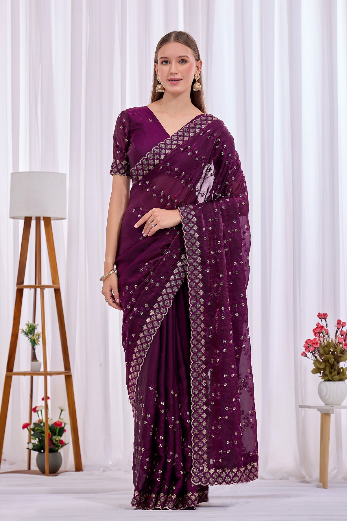 Full length front look of Wine satin floral thread work designer border saree draped on model — Chandrikas