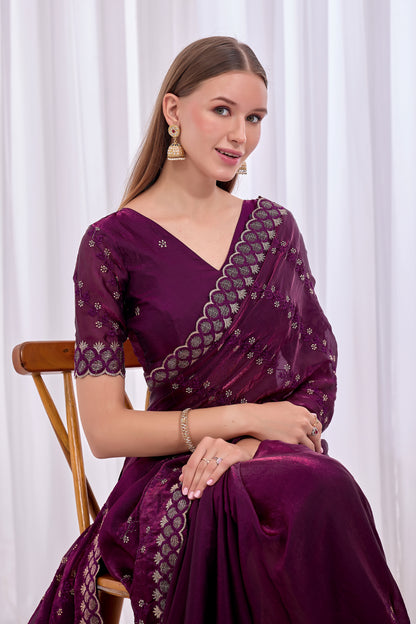 Seated close pose showing embellished border and blouse of Wine satin floral thread work designer border saree — Chandrikas